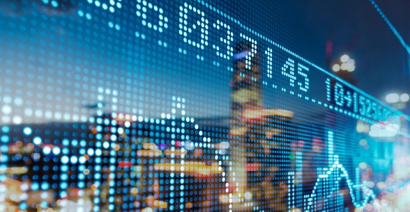 Transparent image of a finance chart overtop the image of a city.