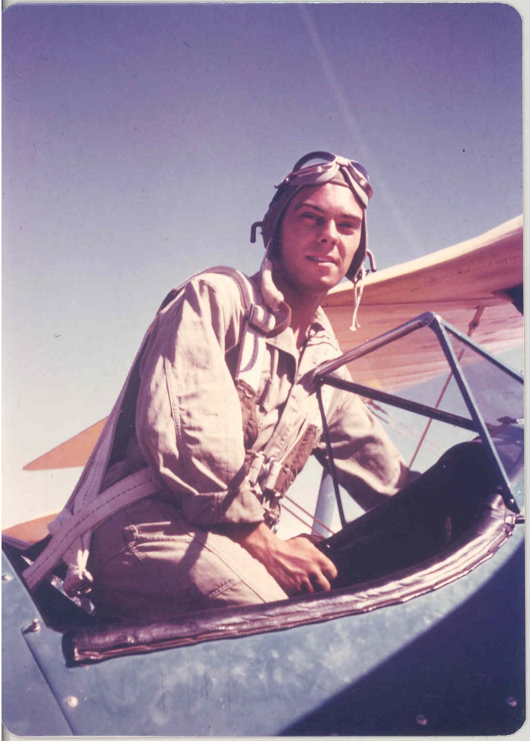 Vintage image of pilot in a propeller plane on Thunderbird School of Global Management's old headquarters.