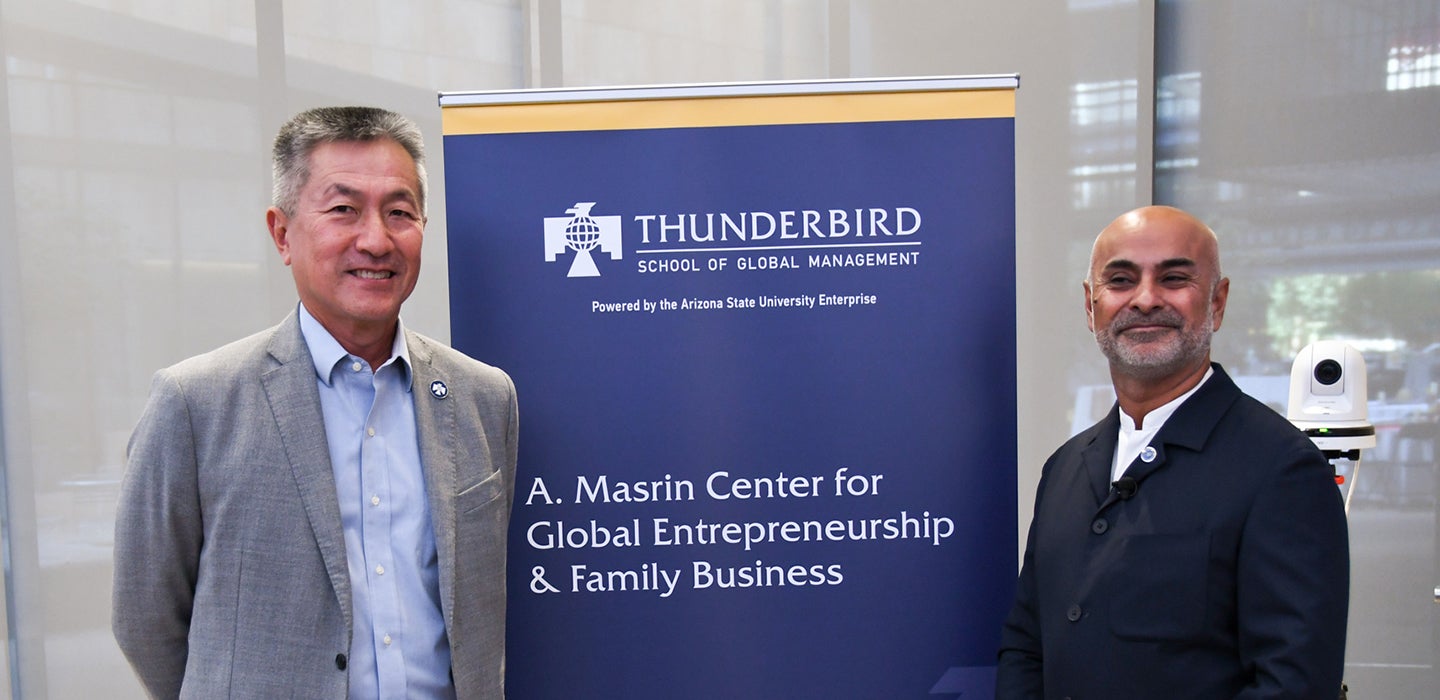 Masrin with Dean Sanjeev Khagram in the Thunderbird Global Forum