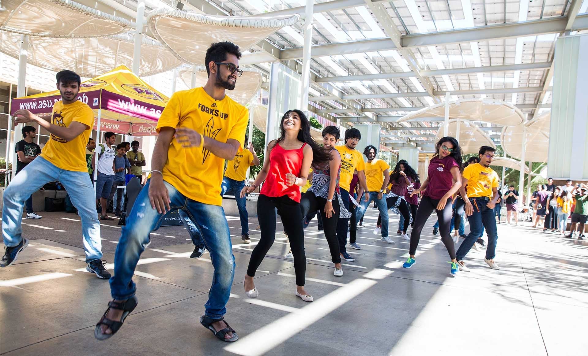 Image of International ASU Thunderbird students dancing