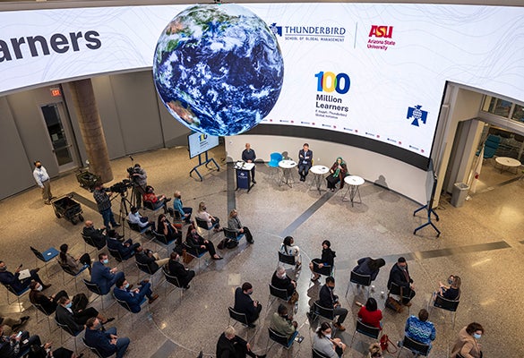 Image of the 100 Million Learners announcement in the Global Forum as seen from above