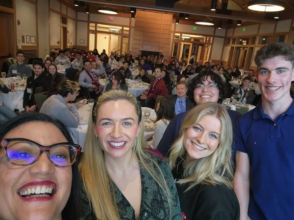 Photo L-R: Team coaches Eva Vázquez Ortiz (Thunderbird), and Catherine Faherty (DCU), with students Grace Mollaghan (DCU), Alex (Thunderbird), and Thomas Lynch (DCU) at the events opening reception brunch. 