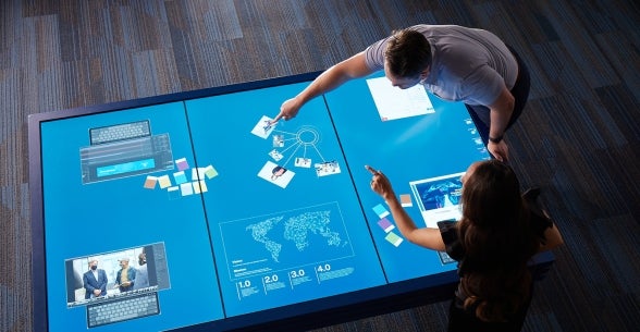 Image of touchscreen technology in Thunderbird's Global Headquarters