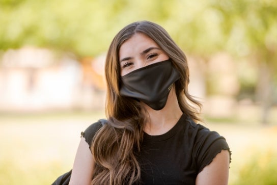 Image of an ASU Thunderbird student wearing a face mask